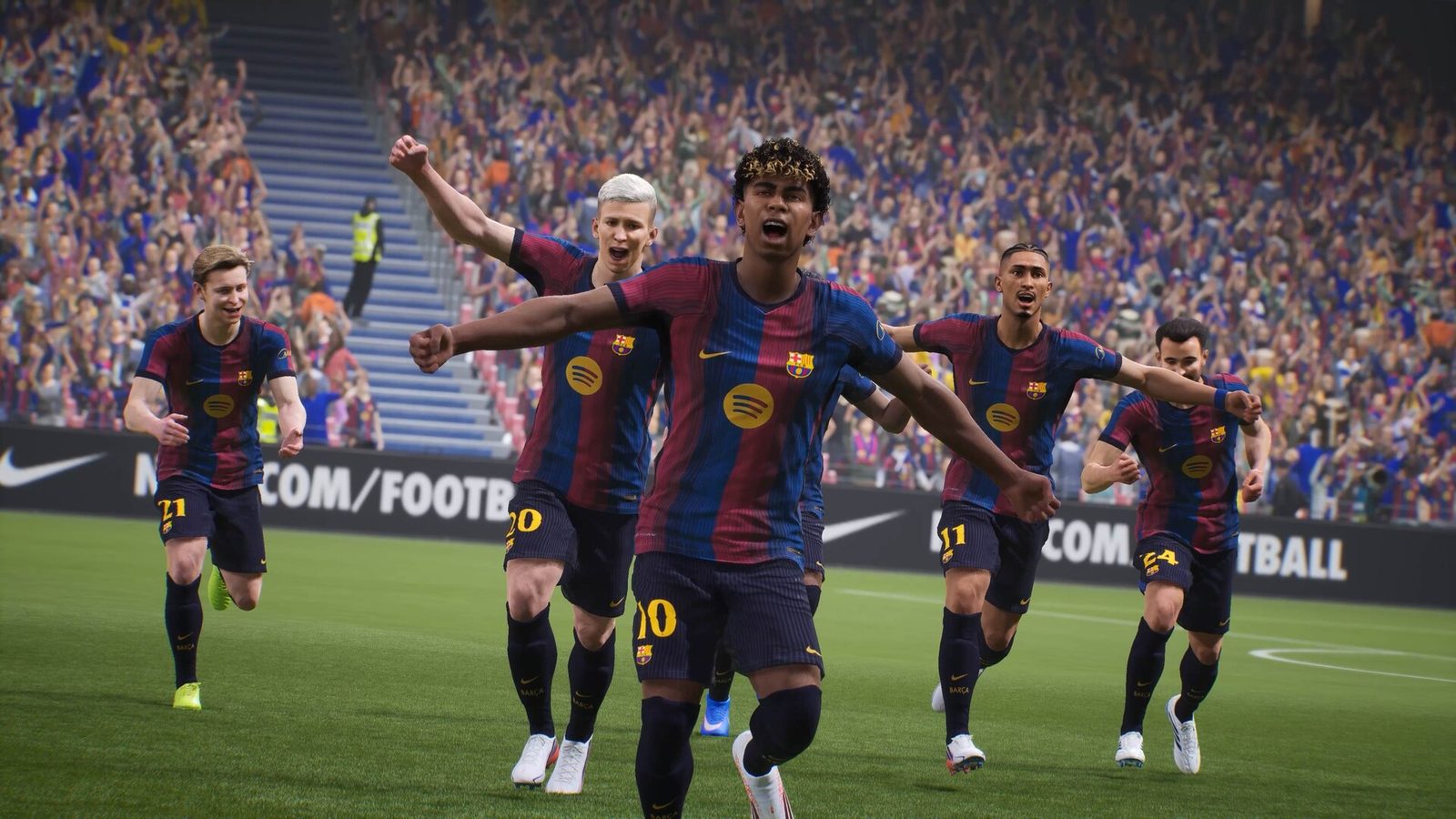 eFootball ピンクと青の円が散りばめられた背景の前で、eFootballのユニフォームを着た2人のサッカー選手がボールを持つ公式画像 3