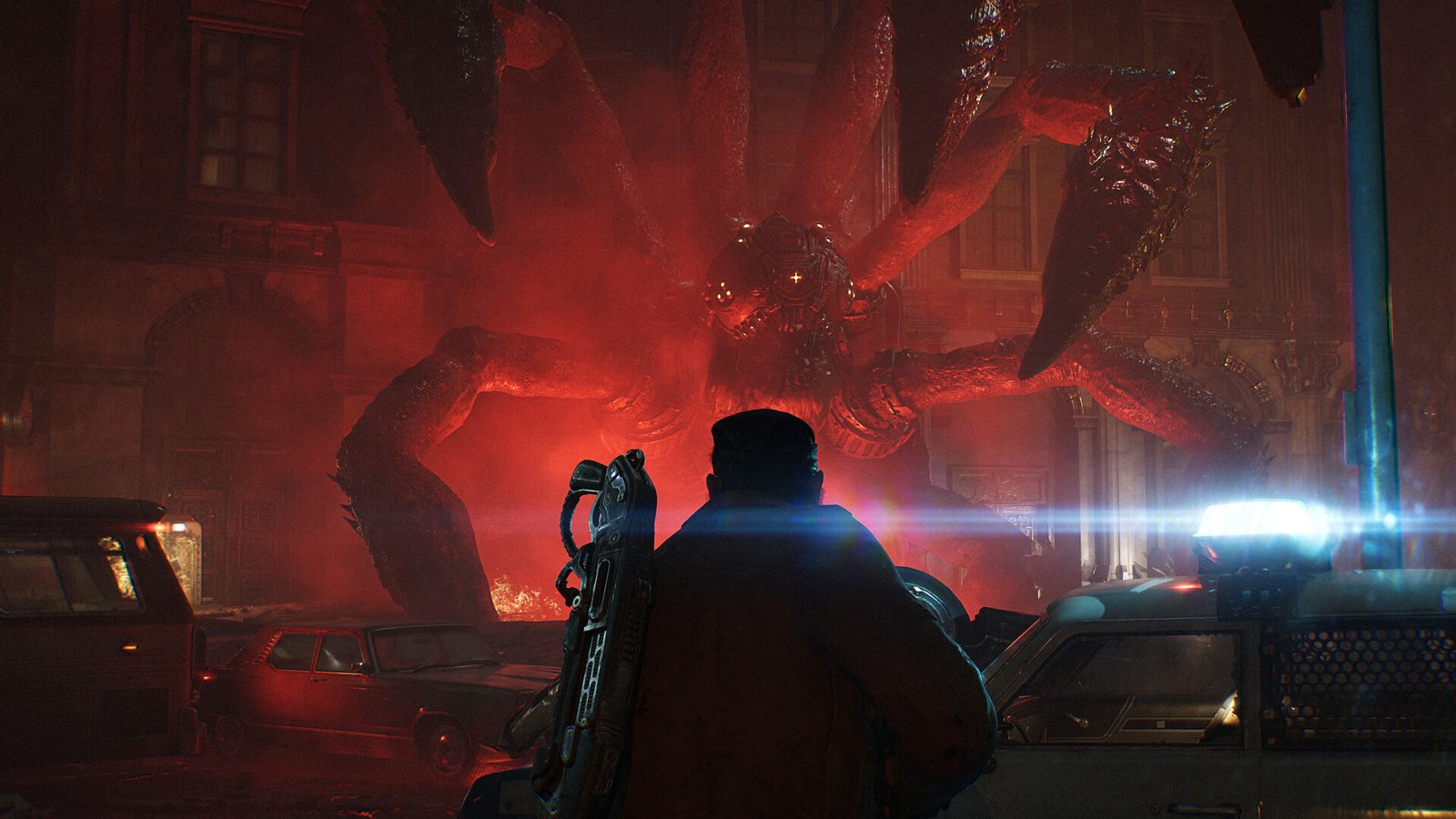 Ilustración promocional de dos soldados armados sobre un terreno rojo agrietado que recuerda a la lava, con la mano de un monstruo gigante descendiendo sobre una ciudad en ruinas detrás de ellos 6
